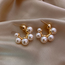 Light and luxurious ~ style advanced sensation ~ fashion pearl earring mesh red temperament female earnail 925 silver silver needle temperament tidal deposit