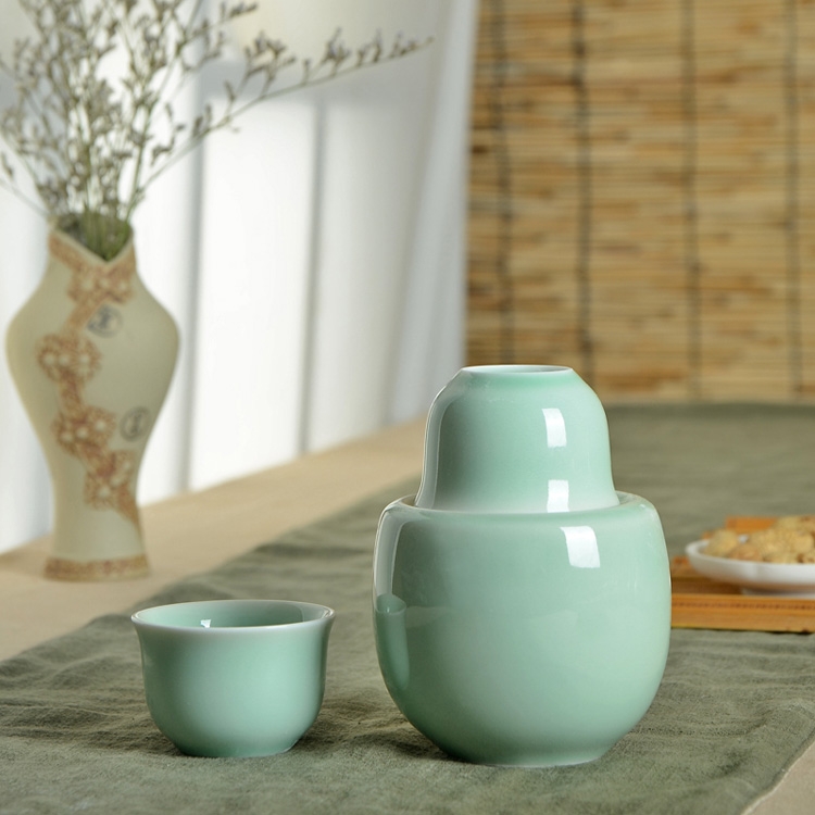 Qiao mu 2 two temperature wine wine wine ceramic perm hip celadon hot warm hip points yellow glass wine cup set