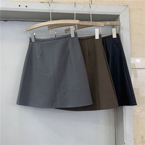 JIAODIAN focus 8862 high waist hip temperament PU leather skirt FEMALE thin anti-walking short skirt A-line skirt