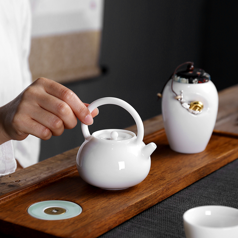 Sand embellish ceramic travel tea set of black suit and contracted Japanese ceramic vehicle is suing teapot portable package