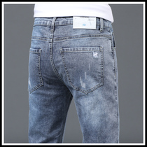 High-end mens jeans Supper body small feet 2022 Summer light color elastic casual long pants Korean version Trend Fall