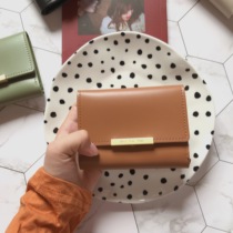 2018 South Koreas new simple solid color buckle PU multi-function mini short folding wallet card bag coin purse female