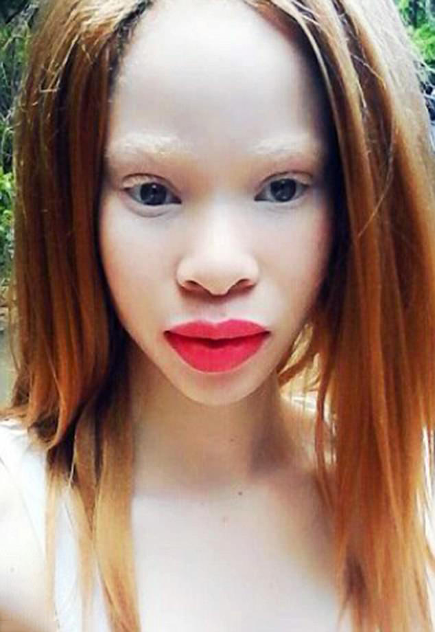 非洲女孩竟然天生是白皮肤金头发蓝眼睛!图片