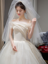 The main wedding dress 2022 new temperament bride dragged the tail and shoulder is about a low-waist pregnant woman French tiny man