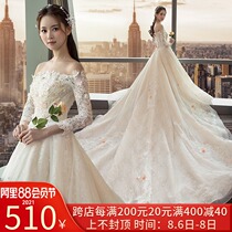 Wedding dress 2021 new champagne color bride one shoulder princess long sleeve petal long tail main yarn female spring