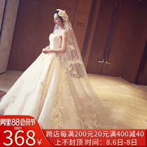 Wedding dress 2021 new pregnant champagne color princess high waist main yarn bride long tail bandeau qi flowers