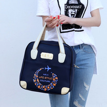 A small bag on a trolley case a small luggage bag a carrying bag a clothes storage bag a portable travel bag a small female bag a small female bag a small female bag a small female bag