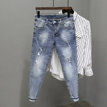 Breaking hole jeans mens Tide brand autumn new simple Joker slim slim foot pants Korean trend ankle-length pants