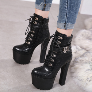 New high-heeled boots with leather and suede