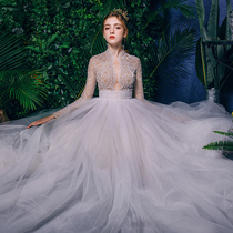 Wedding dress 2021 New temperament bride French simple Mori Super fairy atmosphere long sleeve tailing out door yarn light