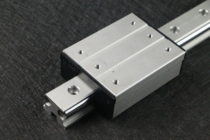 Center-side mounted bearing automatic external double-axis linear guide slider rail cutting knife channel steel rail pulley