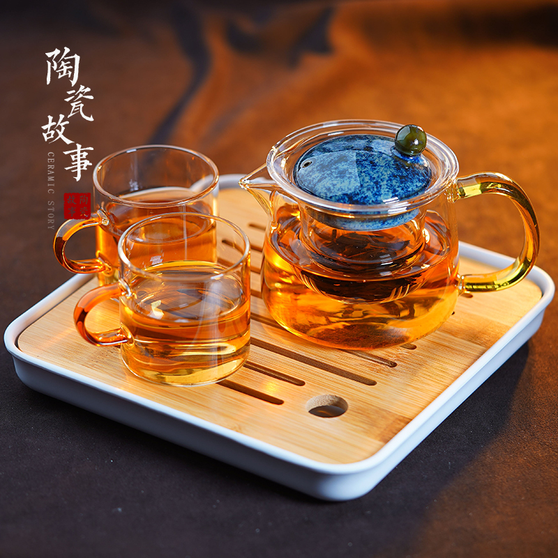 Ceramic story kung fu tea set suit household light cup tea tray of a complete set of high - end key-2 luxury Chinese small glass teapot