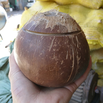 Pre-opened polished old coconut Coconut frozen smoothie container material Hainan black coconut king can be opened in half