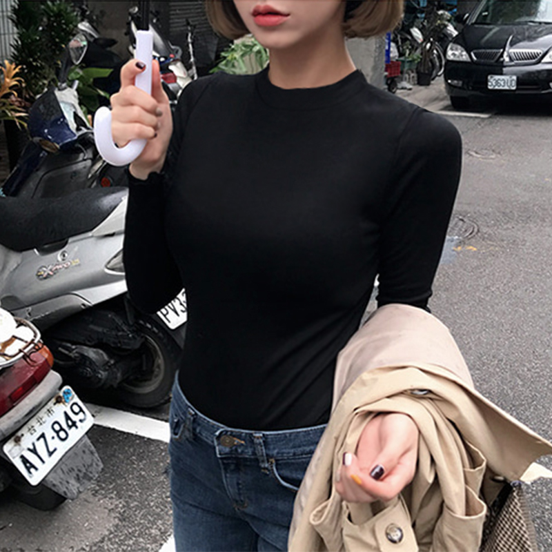 images 2:In early autumn, the black underpacked female long-sleeved t-shirt half-high-collar man in his body images 2:In early autumn, the black underpacked female long-sleeved t-shirt half-high-collar man in his body