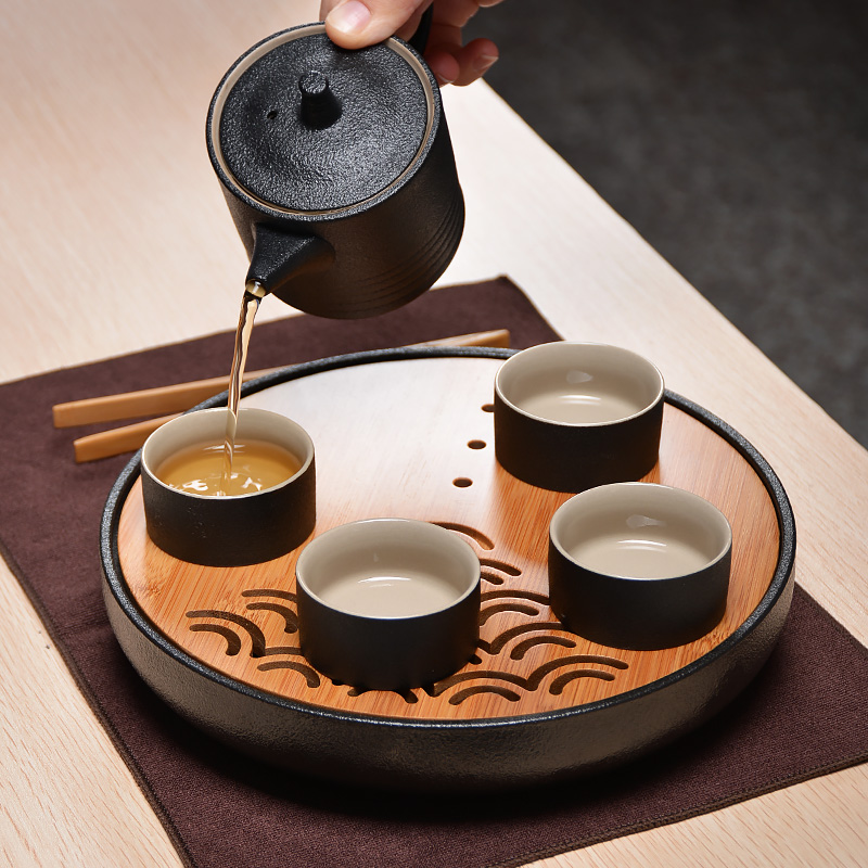 Black pottery tea set suit Japanese household contracted and I ceramic dry tea tray 4 people of a complete set of kung fu tea cups