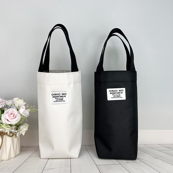 Simple and versatile bento bag breakfast cup bag large capacity braised beaker set portable water cup umbrella handbag
Simple and versatile bento bag breakfast cup bag large capacity braised beaker set portable water cup umbrella handbag