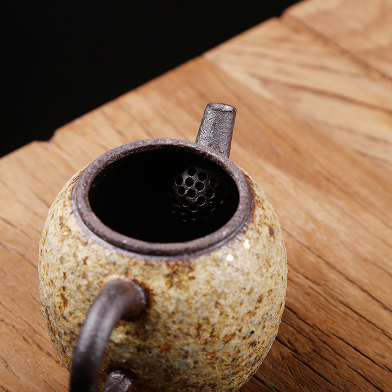 Ancient undressed ore Taiwan sheng up manually lava coarse pottery tea teapot to burn natural fire rock ore ball hole, single pot