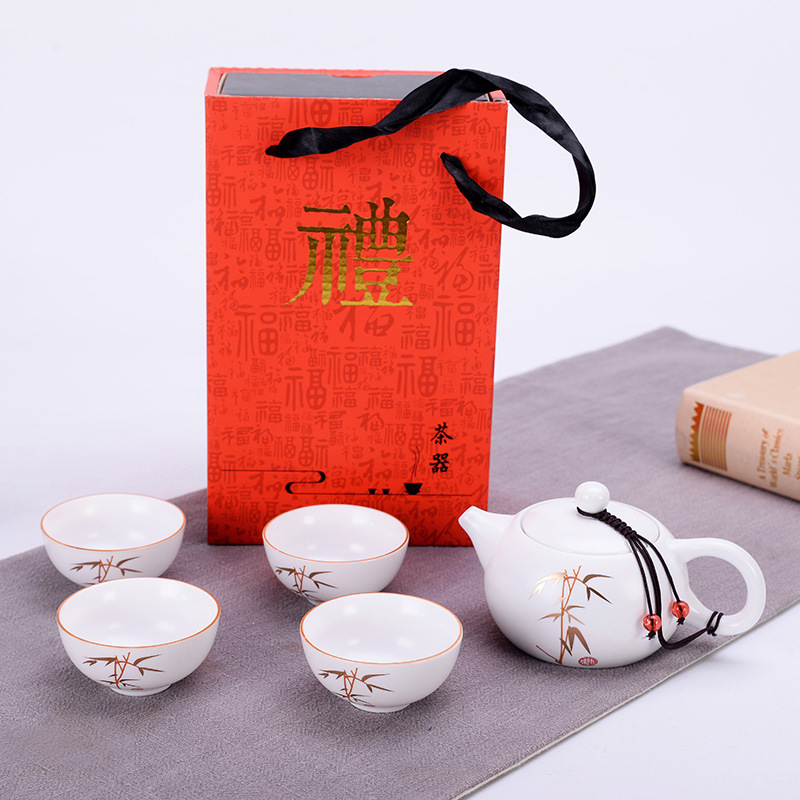 Creative ceramic kung fu tea set a pot of four cups of tea gift box home portable up with inferior smooth travel kit