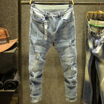 Tide brand light beggar broken hole jeans male thin patch pants Korean version in ultra-hair side nine pants