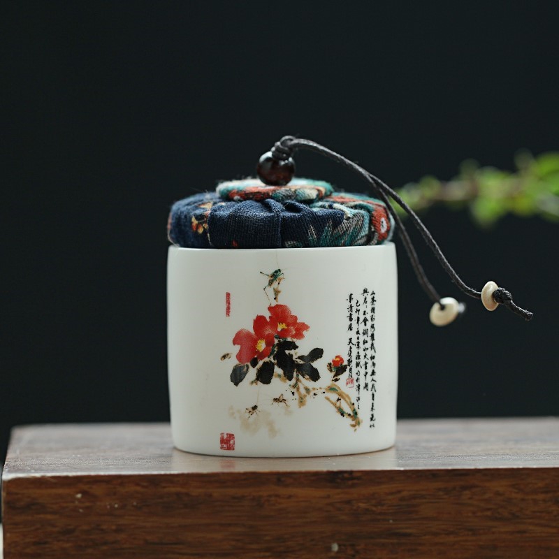 Pu 'er tea pot small ceramic portable tea packaging flower wholesale mini gift box sealed storage jar