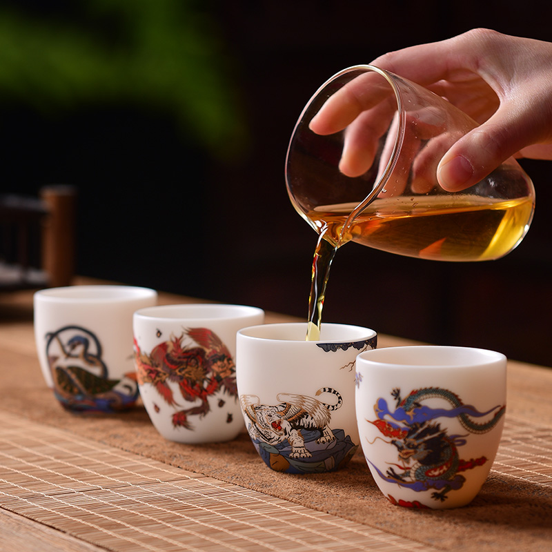 Creative dehua white porcelain suet jade four elephants masters cup cup of pure checking ceramic cups sample tea cup from the lamp