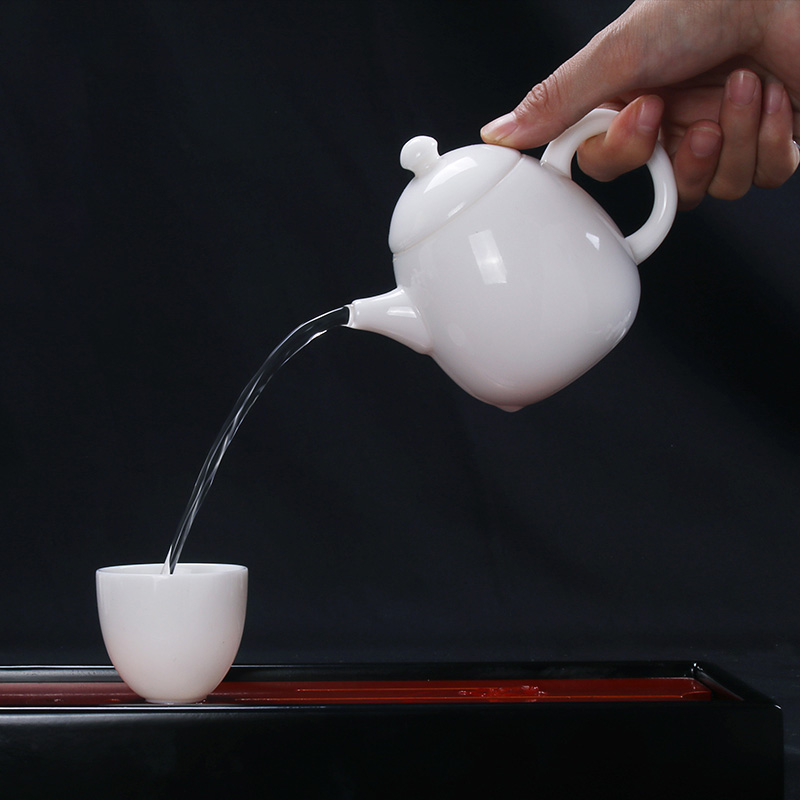 Dehua white porcelain ceramic teapot kung fu tea tureen to use household Long Dan pot of filter with three cups to use