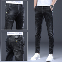 Hong Kong high-end mens black jeans Tide brand elastic slim feet Korean version of the trend Joker trousers autumn and winter