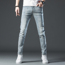 Hong Kong high-end 2021 autumn light color denim trousers mens Tide brand slim feet stretch Joker casual mens pants