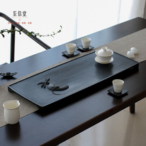 Zhi Xintang master handmade natural whole piece of Wujin Stone tea tray black gold stone stone Tea Table large stone Tea Sea