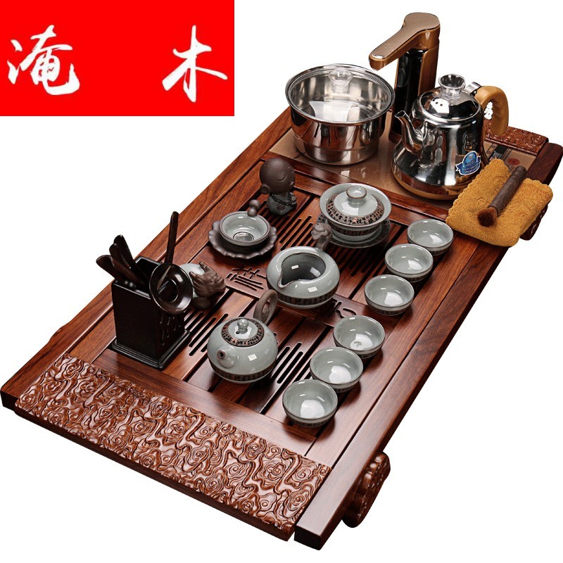 Submerged wood hua limu tea tray of a complete set of violet arenaceous elder brother up kung fu tea set four unity induction cooker tea tea set