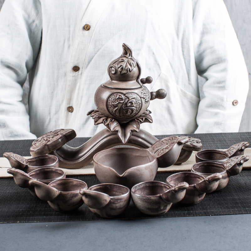 Creative NiuRen half automatic tea sets a complete set of kung fu tea set lazy restoring ancient ways against the hot tea ware ceramics
