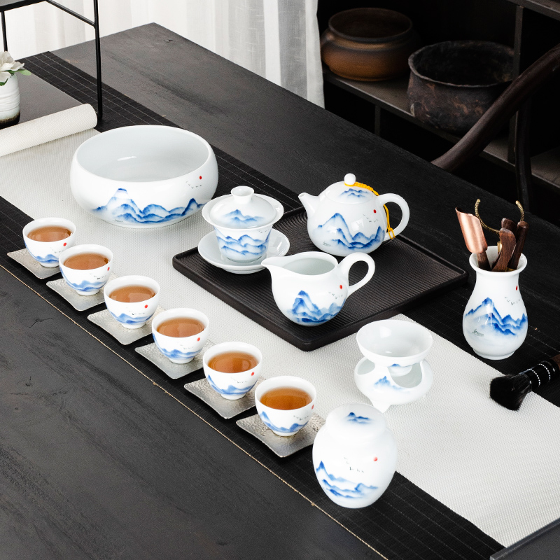 NiuRen white porcelain hand - made kung fu tea set home tea cup lid bowl tea to wash to the whole office tea sets