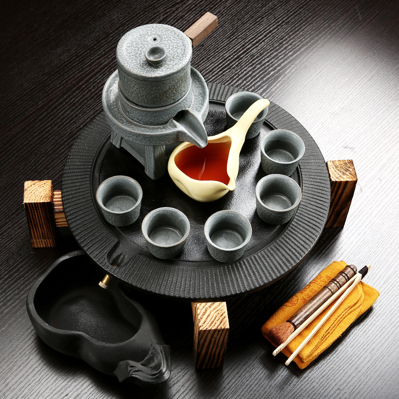 NiuRen retro stone mill automatic tea set ceramic color tea tray was home a whole set of violet arenaceous kung fu tea sets tea table