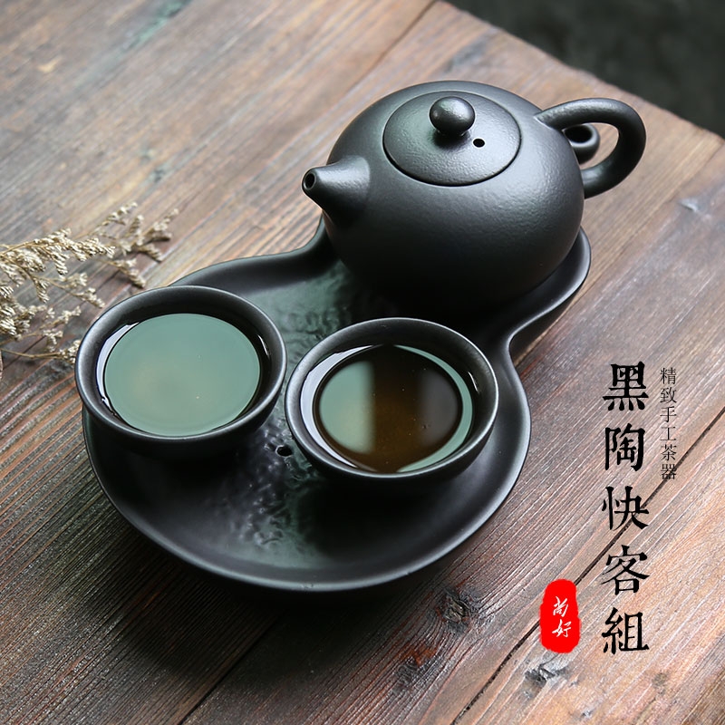 A pot of two cups of black zen portable travel kung fu tea set crack cup with ceramic creative office tea tea tray