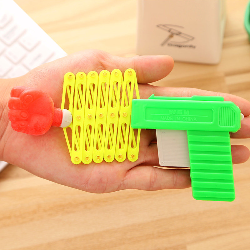 伸缩拳头玩具枪儿童整蛊搞怪玩具魔术弹力拳头枪80后童年怀旧经典