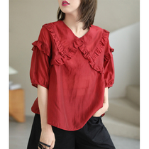 Xiao said small crowdsourced special design literature and art retro summer thin section of lotus leaf side dolls lead silk shirt female 2021