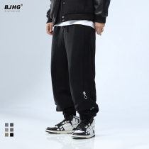 Winter drawstring labeling plus velvet warm pants for men and women with Street Tide brand loose hip-hop style