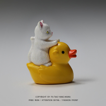 The clockwork is boring and watching the kitty ride a duck swing.