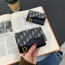 Korean version of the printed small wallet female short ins simple folding wild retro exquisite high-end card bag coin purse female