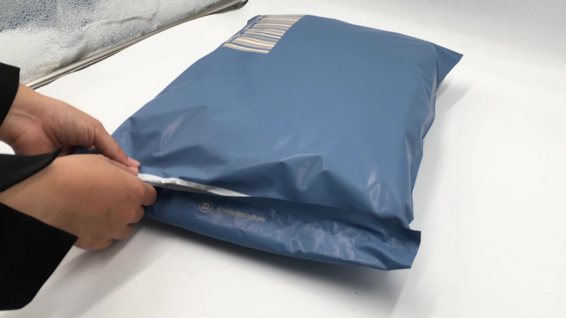 shipping袋定制logo超人图案印刷邮袋快递袋衣服