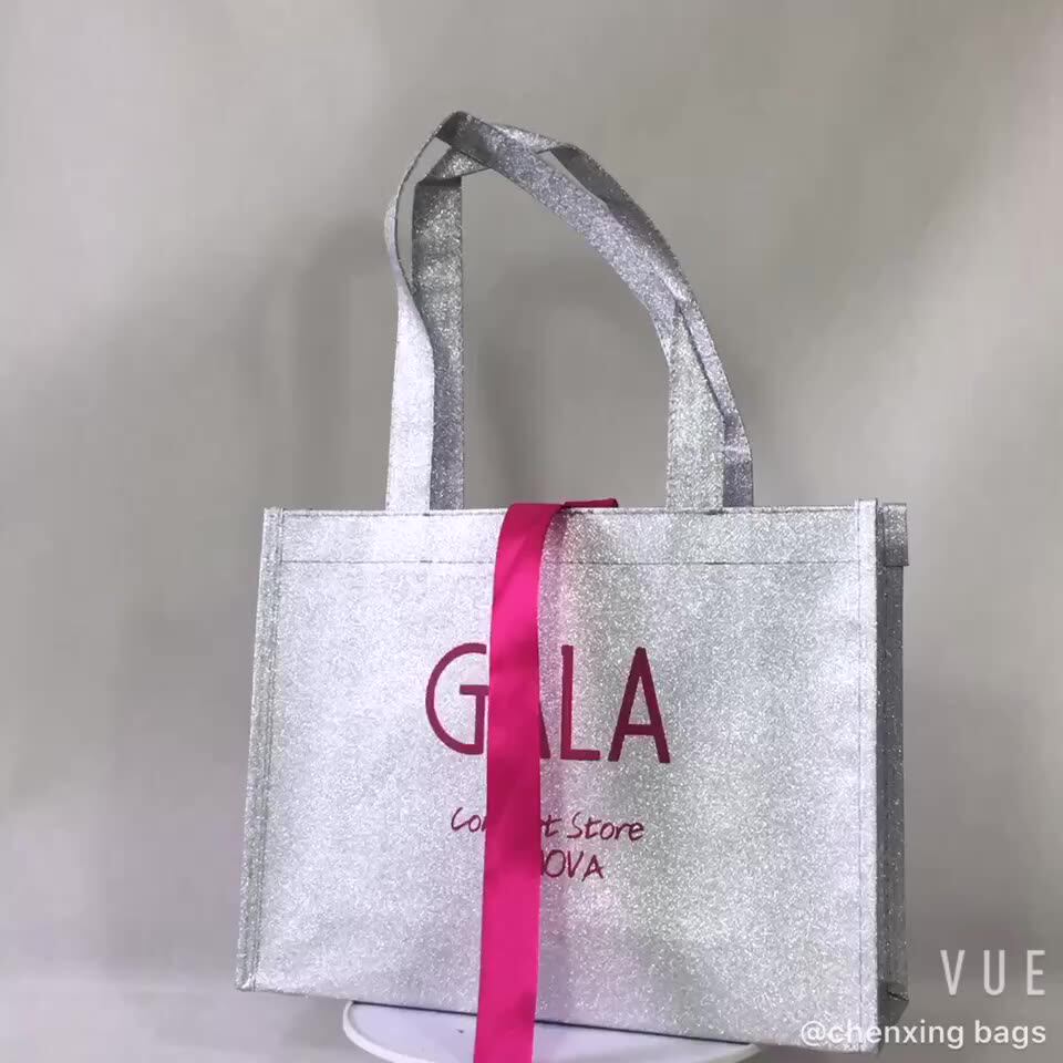 small non woven glitter gift shopping bag with pink stain ribbon
