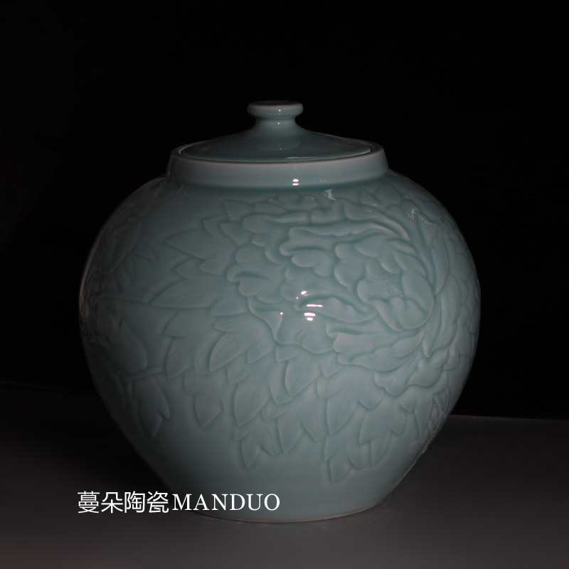 Shadow green ceramic rice pot peony beautiful carving elegant elegant loading ceramic barrel 25 kg of rice jar of storage tank