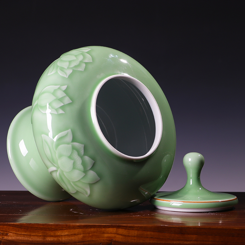Jingdezhen ceramics craft furnishing articles reliefs green glaze lotus general tank storage tank is a new Chinese style household ornaments
