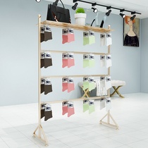 Socks shelf boxed underwear shelf display rack hanging mobile phone shell jewelry Nakajima multi-function slipper display rack