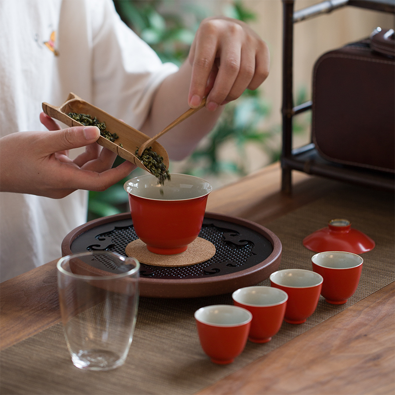 Kung fu tea set a pot of jingdezhen ceramic travel four cups of portable is suing tourism tea crack cups