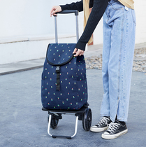 The elderly can buy a vegetable cart a cart a cart a large wheel a bucket a portable folding trailer