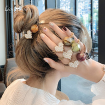 Cute imitation pearl peach heart rope female simple Korean version of net red Hairband Korean girl sweet leather band hair rope headdress