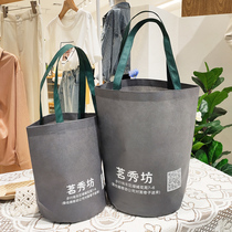 Non-woven round bottom bag custom bucket handbag garment bag custom-made environmental shopping training bag custom logo