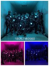 Programming the Iron Man Electro-Optic Dance Act Out of the Dancing Gogo Performance Glowing Serve the Future Warring Fluorescent Dance Business