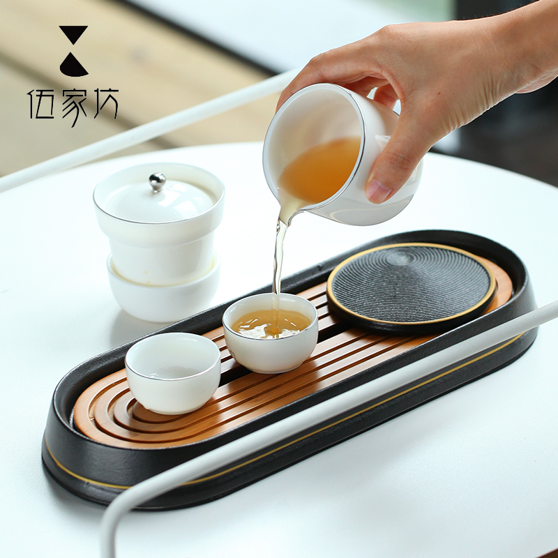 The Wu family travel lane ceramic suit Japanese crack cup creative portable receive small package kung fu tea set home